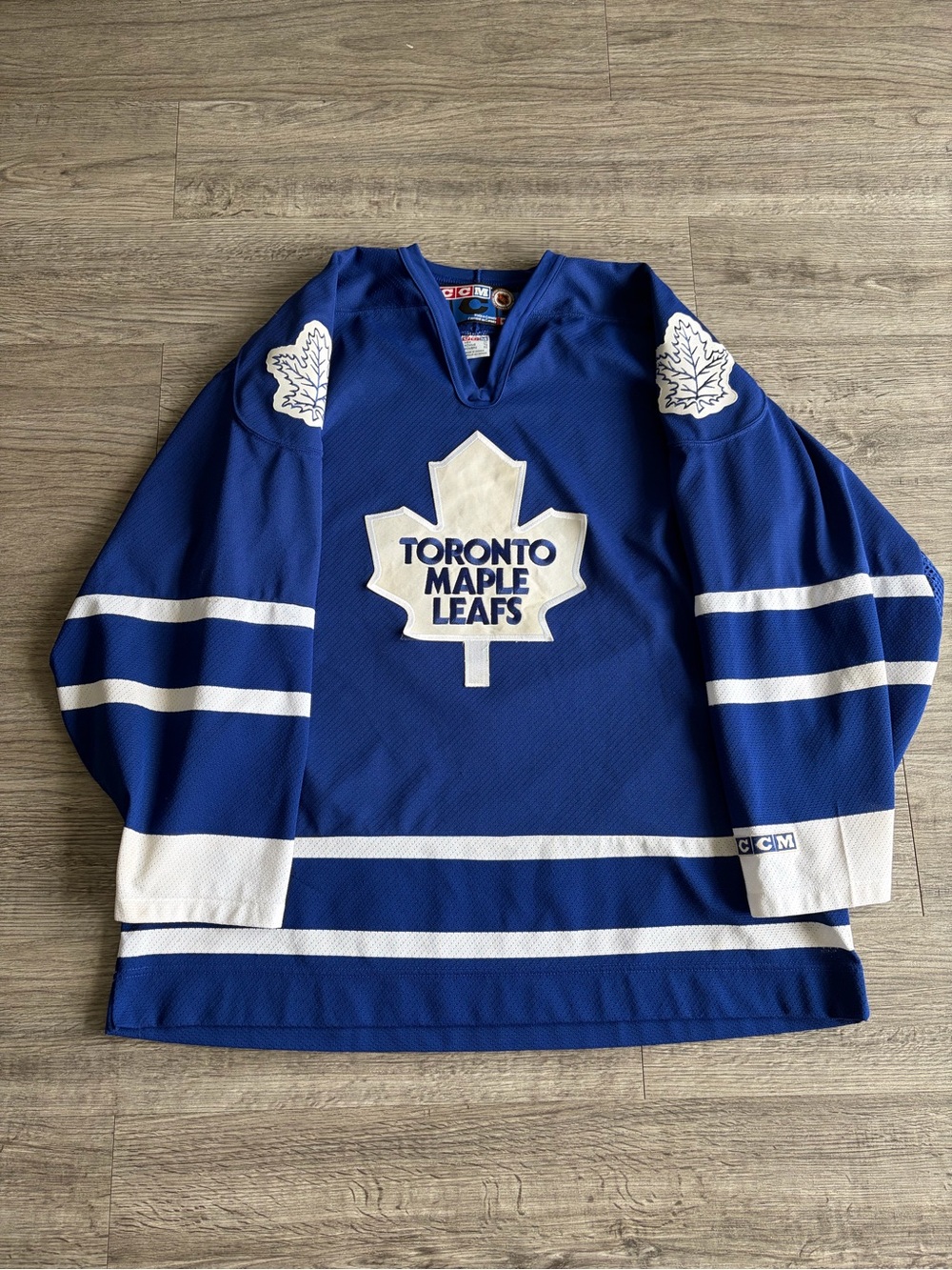 CCM Men’s Blue and White V-Neck Sweater with Maple Leaf Crest
